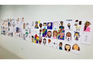 Gallery wall of portraits hand drawn by children Gallery wall of portraits hand drawn by children