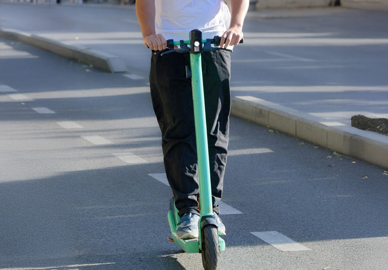Person riding an electric scooter