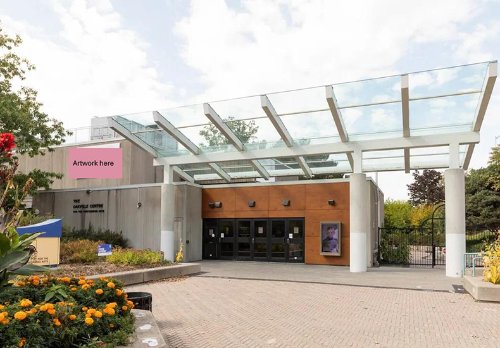 Public art placement on the outside south entrance wall of the Oakville Centre for the Performing Arts Public art placement on the outside south entrance wall of the Oakville Centre for the Performing Arts