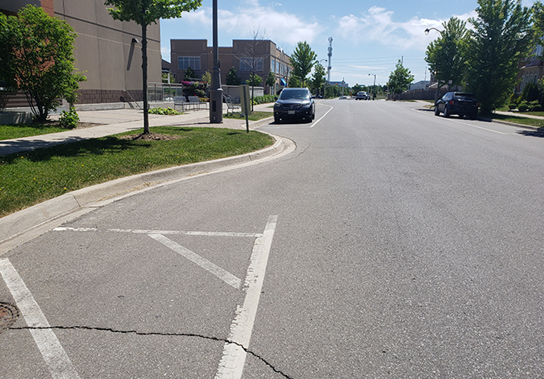 Curb extensions are one of the traffic calming measures implemented in the Town of Oakville to help reduce traffic speed and volume.