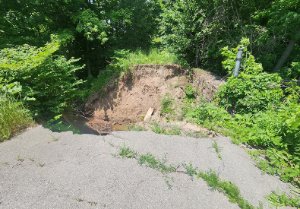 Washed out roadway and collapsed culvert at Trafalgar Lawn Cemetery