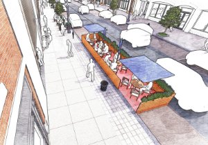 On-street Patio: An enclosed patio in a parking space on the road.