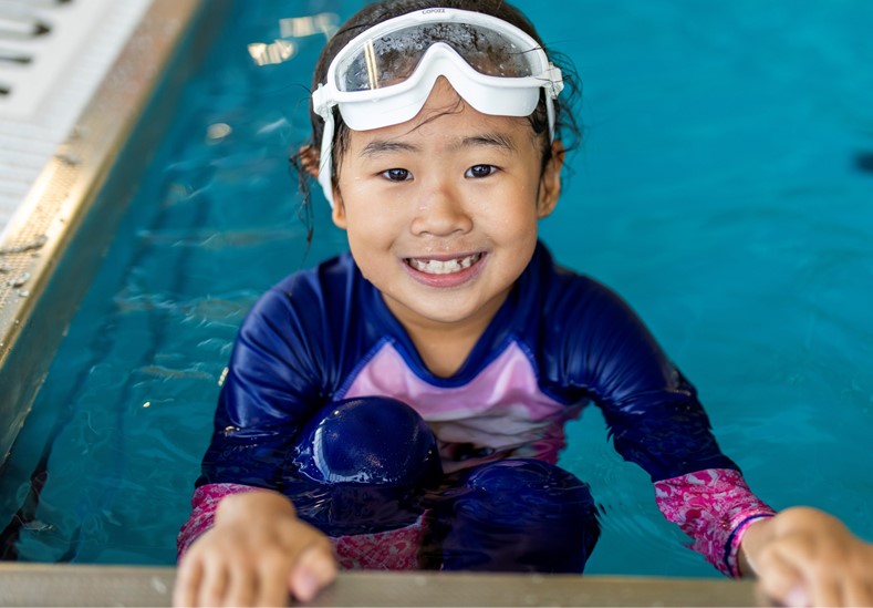 Image of a child in a pool.
