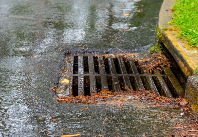Stormwater drain on the road.