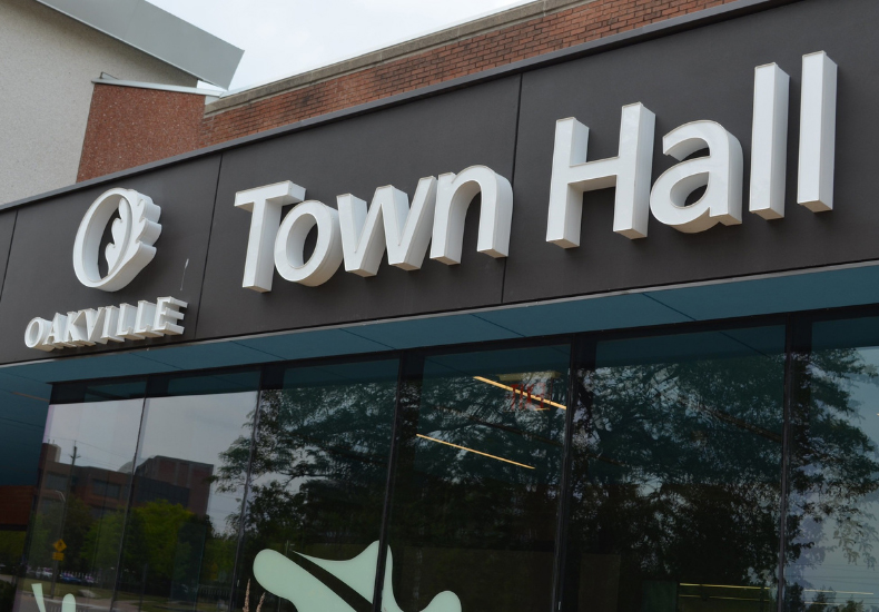 The Town Hall sign at the front of the building