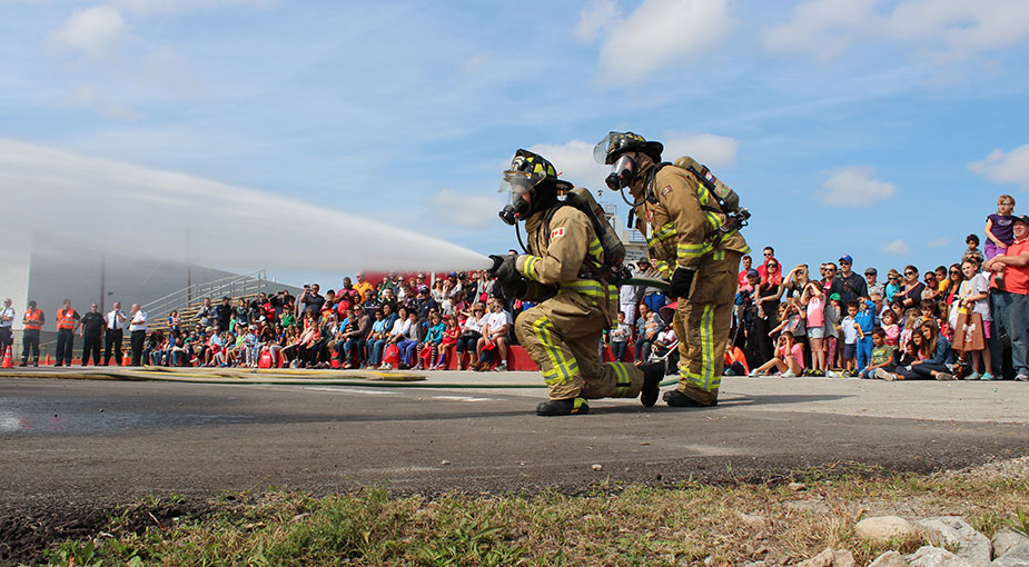 Firefighters at Fire Prevention event.