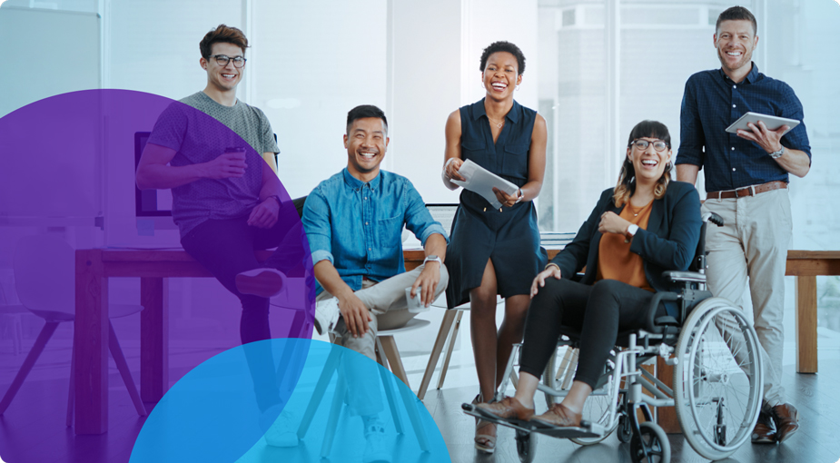 A group of people gathered in an office setting.